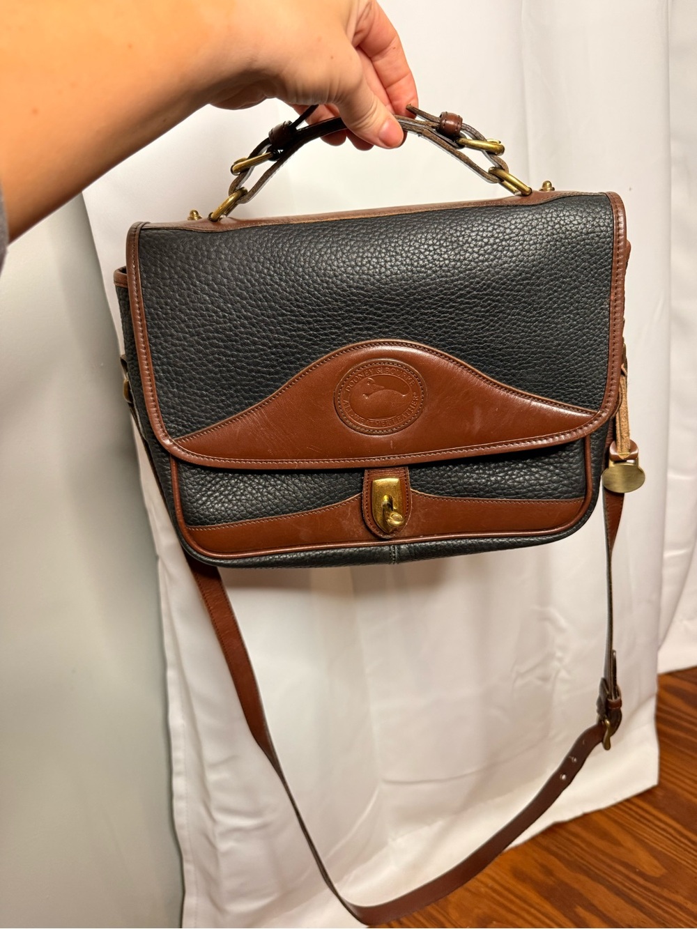 Dooney & Bourke Black Pebbled Leather Satchel with Brown Trim